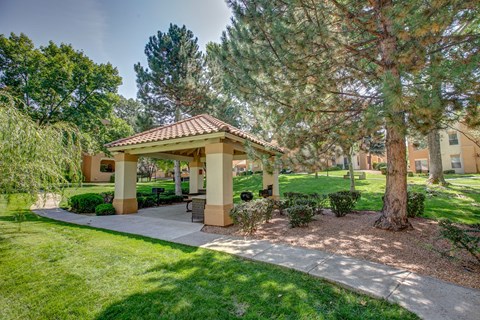 a gazebo with trees and grass in the background at Vizcaya, Santa Fe, New Mexico